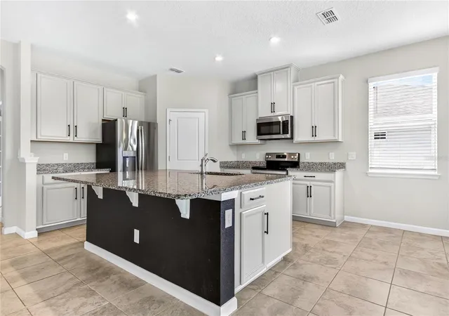 Photo 4 of Single family home for sale at 2304 Tudor Rose Dr, Sanford, FL 32773 | MLS# O6448091 | Listing updated on 2026-10-08