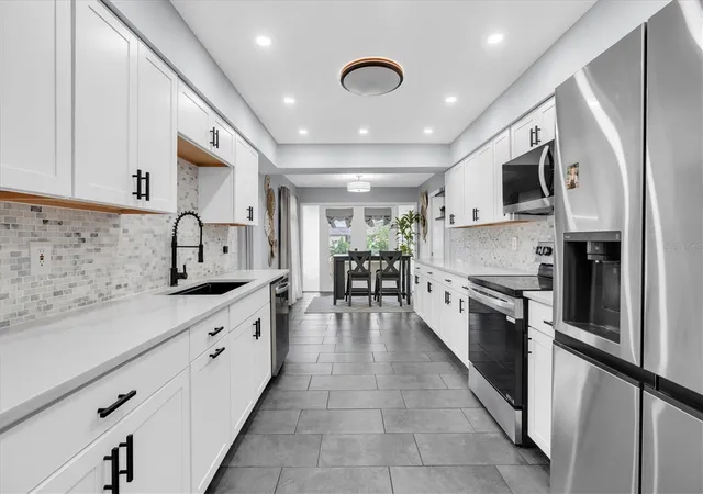 Photo 2 of Single family home for sale at 8721 Latham Ln, Hudson, FL 34667 | MLS# W7890171 | Listing updated on 2026-10-08