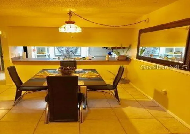 Photo 3 of Condo for sale at 5052 Terrace Clb Ln #101, Tampa, FL 33617 | MLS# TB8555906 | Listing updated on 2026-10-08