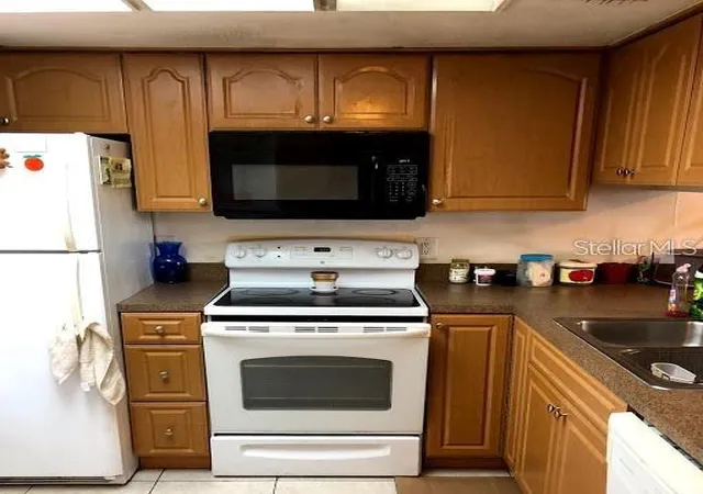 Photo 4 of Condo for sale at 5052 Terrace Clb Ln #101, Tampa, FL 33617 | MLS# TB8555906 | Listing updated on 2026-10-08