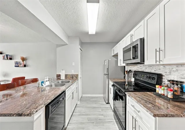 Photo 3 of Condo for sale at 8711 Rockingham Ter #A, Kissimmee, FL 34747 | MLS# O6448097 | Listing updated on 2026-10-10