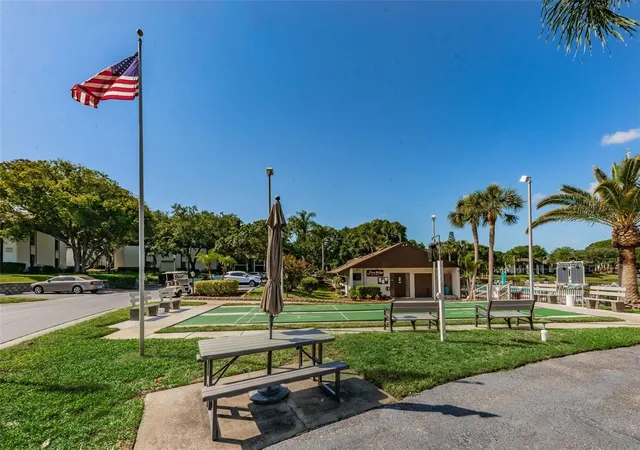 Photo 2 of Condo for sale at 2575 Pine Ridge Way S #E1, Palm Harbor, FL 34684 | MLS# TB8555908 | Listing updated on 2026-10-09