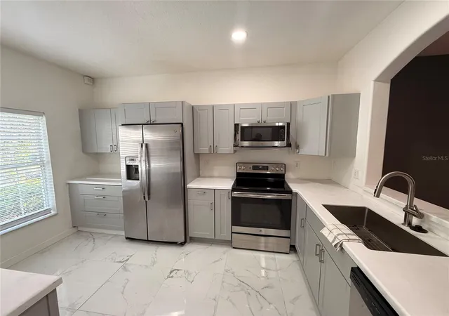 Photo 2 of Townhouse for sale at 3454 High Hampton Cir, Tampa, FL 33610 | MLS# A4708849 | Listing updated on 2026-10-12