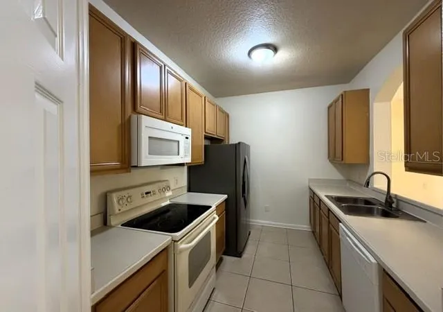 Photo 2 of Condo for sale at 6084 Stevenson Dr #204, Orlando, FL 32835 | MLS# O6448163 | Listing updated on 2026-10-08