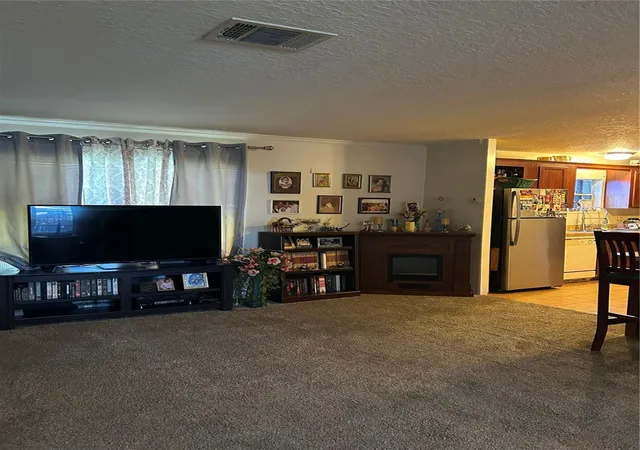 Photo 2 of Manufactured home for sale at 7407 Sabre St, Orlando, FL 32822 | MLS# O6448169 | Listing updated on 2026-10-12
