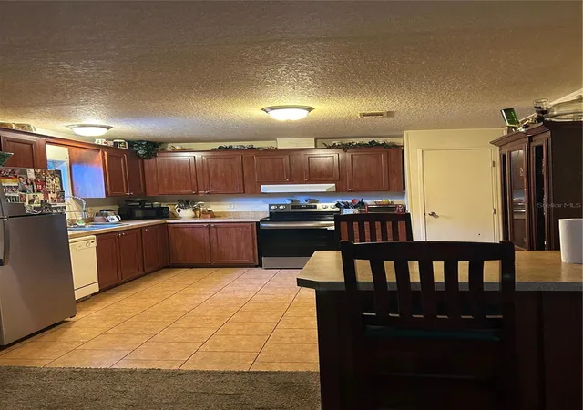 Photo 3 of Manufactured home for sale at 7407 Sabre St, Orlando, FL 32822 | MLS# O6448169 | Listing updated on 2026-10-12