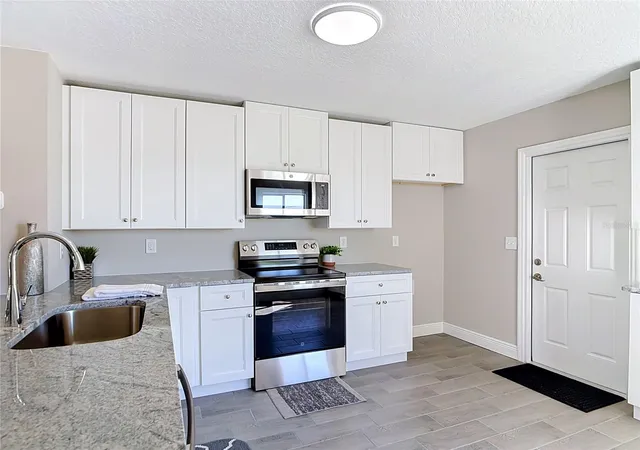 Photo 3 of Single family home for sale at 3025 Foxboro Cir, Deltona, FL 32738 | MLS# O6448179 | Listing updated on 2026-10-18