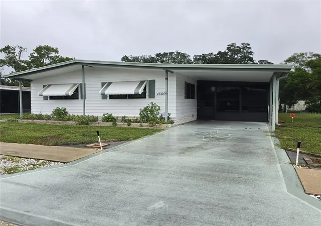 Photo 4 of Manufactured home for sale at 16802 Harley St, Hudson, FL 34667 | MLS# W7890179 | Listing updated on 2026-10-10