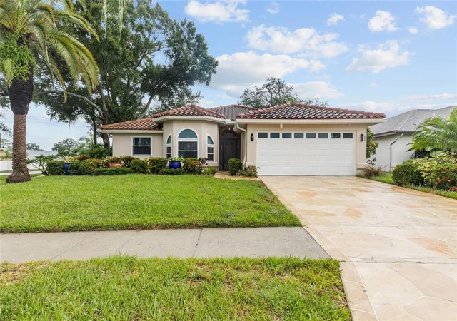 Photo 2 of Single family home for sale at 4897 Harbor Woods Dr, Palm Harbor, FL 34683 | MLS# TB8556005 | Listing updated on 2026-10-10