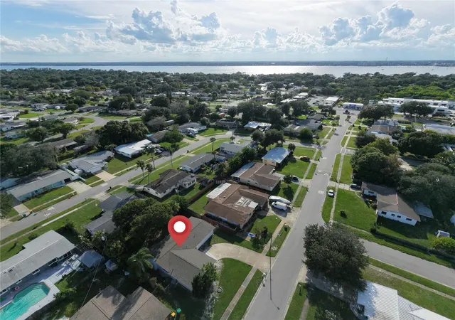 Photo 3 of Single family home for sale at 105 Carib Dr, Merritt Island, FL 32952 | MLS# O6448187 | Listing updated on 2026-10-08
