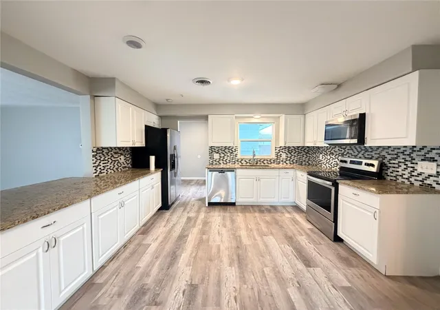 Photo 4 of Single family home for sale at 105 Carib Dr, Merritt Island, FL 32952 | MLS# O6448187 | Listing updated on 2026-10-08
