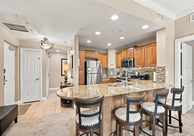 Photo 3 of Condo for sale at 7697 Heritage Xing Way #201, Reunion, FL 34747 | MLS# S5159098 | Listing updated on 2026-10-11