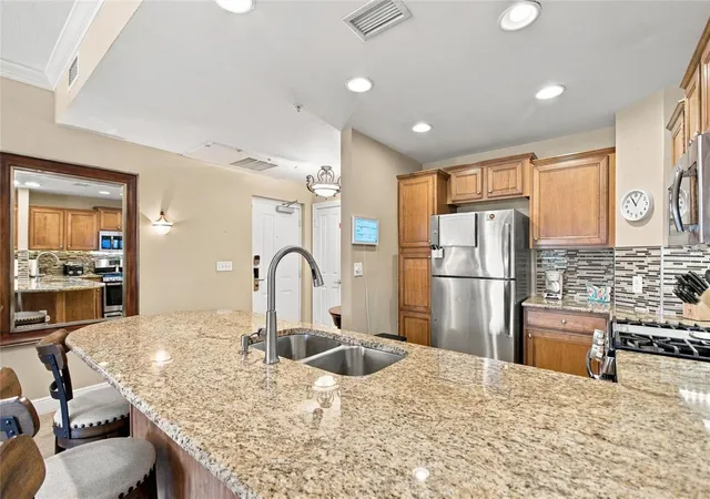 Photo 4 of Condo for sale at 7697 Heritage Xing Way #201, Reunion, FL 34747 | MLS# S5159098 | Listing updated on 2026-10-11