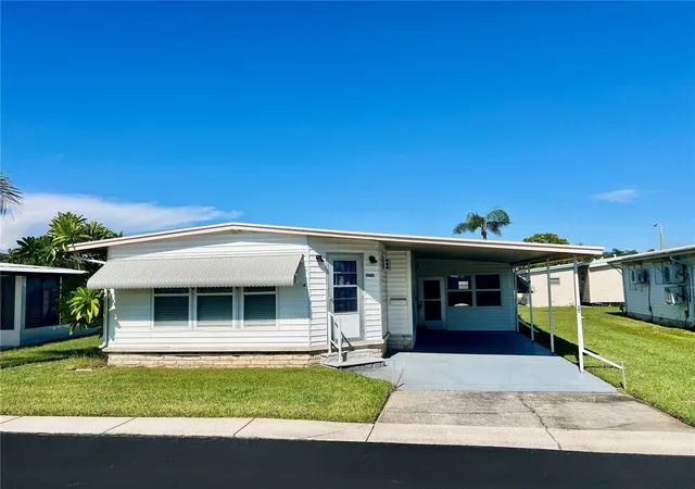 Photo 1 of Manufactured home for sale at 10811 Freedom Dr, Port Richey, FL 34668 | MLS# W7890180 | Listing updated on 2026-10-08