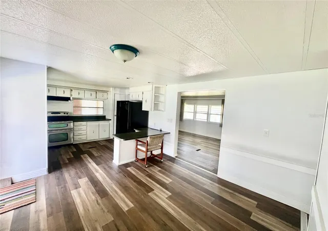 Photo 3 of Manufactured home for sale at 10811 Freedom Dr, Port Richey, FL 34668 | MLS# W7890180 | Listing updated on 2026-10-08