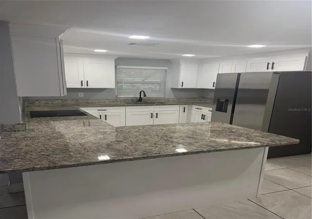 Photo 4 of Single family home for sale at 8501 N Packwood Ave, Tampa, FL 33604 | MLS# TB8556020 | Listing updated on 2026-10-09