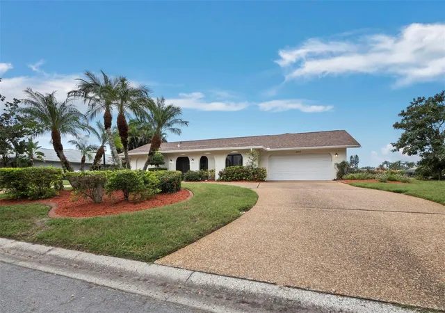 Photo 1 of Single family home for sale at 6945 Country Lakes Cir, Sarasota, FL 34243 | MLS# A4708876 | Listing updated on 2026-10-09