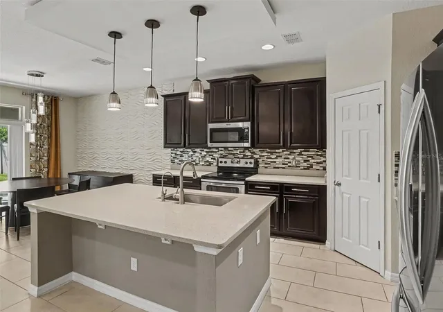 Photo 4 of Single family home for sale at 3208 Stonewyck St, Orlando, FL 32824 | MLS# O6448211 | Listing updated on 2026-10-08