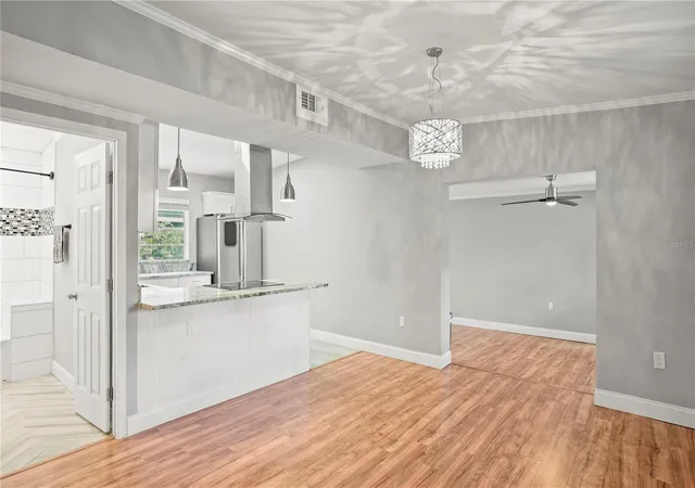 Photo 4 of Single family home for sale at 1300 S Dewey St, Eustis, FL 32726 | MLS# O6448218 | Listing updated on 2026-10-23