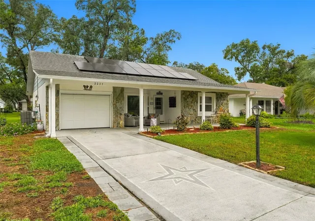 Photo 2 of Single family home for sale at 2277 Pebble Beach Dr, Spring Hill, FL 34606 | MLS# W7890181 | Listing updated on 2026-10-08