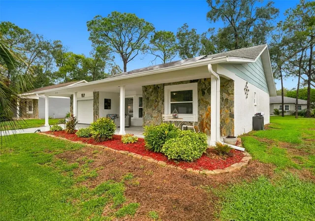 Photo 3 of Single family home for sale at 2277 Pebble Beach Dr, Spring Hill, FL 34606 | MLS# W7890181 | Listing updated on 2026-10-08