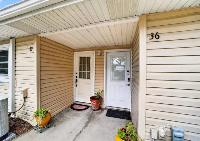 Photo 3 of Condo for sale at 11001 Se Sunset Harbor Rd #E36, Summerfield, FL 34491 | MLS# OM733669 | Listing updated on 2026-10-08