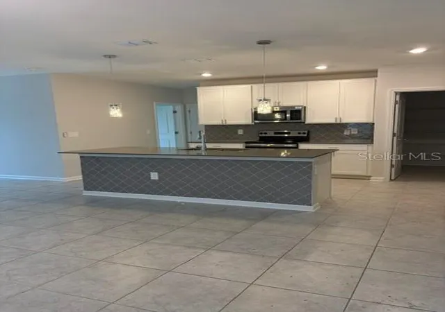 Photo 4 of Single family home for sale at 1026 John Jacob Rd, Davenport, FL 33837 | MLS# O6448249 | Listing updated on 2026-10-09