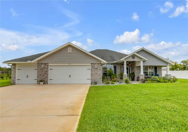 Photo 1 of Single family home for sale at 215 Lagoon Mist Ct, Oak Hill, FL 32759 | MLS# O6448257 | Listing updated on 2026-10-09