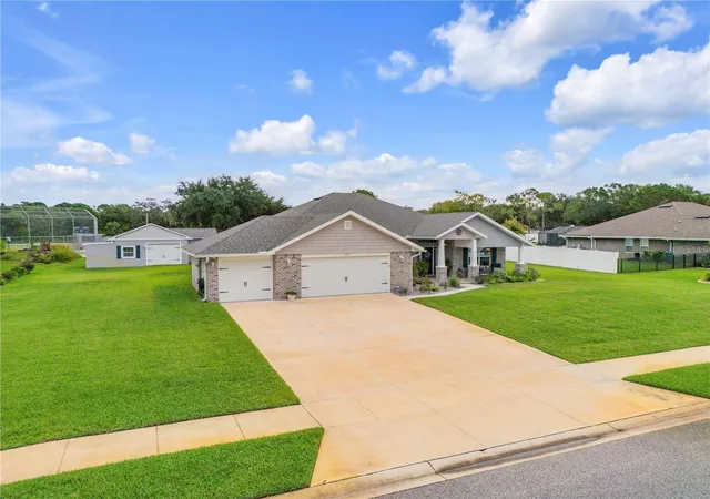 Photo 2 of Single family home for sale at 215 Lagoon Mist Ct, Oak Hill, FL 32759 | MLS# O6448257 | Listing updated on 2026-10-09