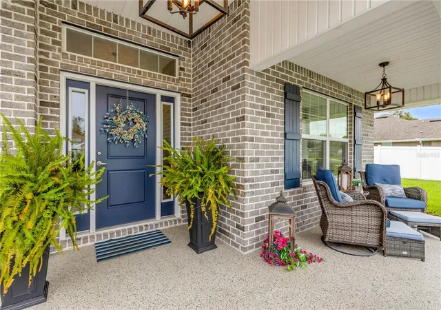 Photo 3 of Single family home for sale at 215 Lagoon Mist Ct, Oak Hill, FL 32759 | MLS# O6448257 | Listing updated on 2026-10-09