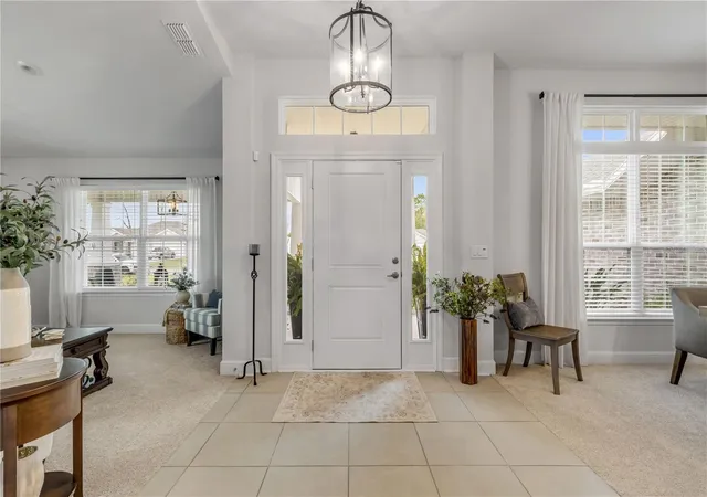 Photo 4 of Single family home for sale at 215 Lagoon Mist Ct, Oak Hill, FL 32759 | MLS# O6448257 | Listing updated on 2026-10-09