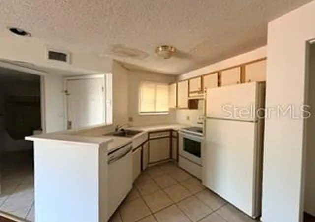 Photo 1 of Condo for sale at 1908 Lake Atriums Cir #18, Orlando, FL 32839 | MLS# O6448275 | Listing updated on 2026-10-08
