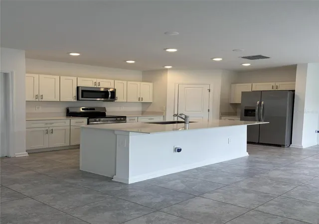Photo 4 of Single family home for sale at 1338 Deepwater Cir, Eagle Lake, FL 33839 | MLS# O6448284 | Listing updated on 2026-10-09