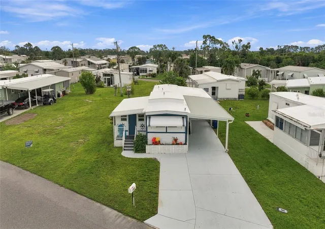 Photo 3 of Manufactured home for sale at 349 Blackburn Blvd, North Port, FL 34287 | MLS# C7531727 | Listing updated on 2026-10-08