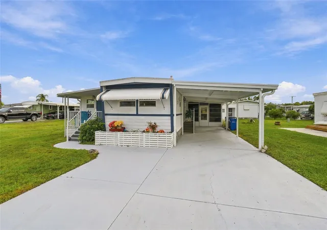 Photo 3 of Manufactured home for sale at 349 Blackburn Blvd, North Port, FL 34287 | MLS# C7531727 | Listing updated on 2026-10-08