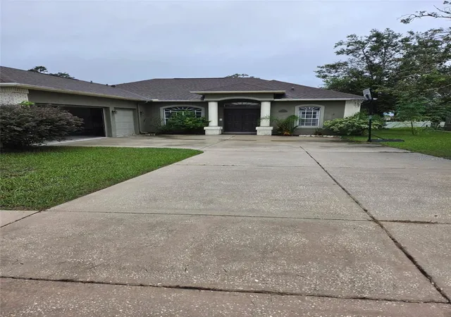 Photo 1 of Single family home for sale at 1201 Overland Dr, Spring Hill, FL 34608 | MLS# TB8556145 | Listing updated on 2026-10-08