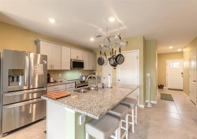 Photo 4 of Townhouse for sale at 84 Bella Lago Cir, Port Orange, FL 32129 | MLS# V4951708 | Listing updated on 2026-10-08