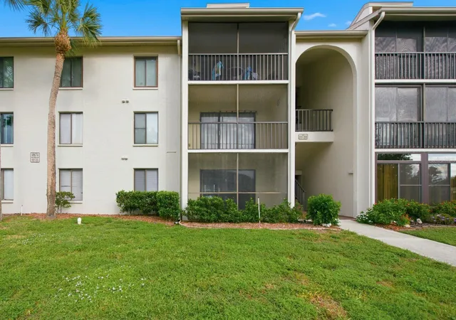 Photo 1 of Condo for sale at 1871 Pine Ridge Way W #E1, Palm Harbor, FL 34684 | MLS# TB8556171 | Listing updated on 2026-10-08