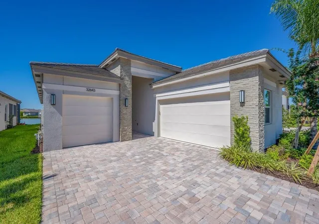 Photo 4 of Single family home for sale at 32643 Neroli St, Wesley Chapel, FL 33543 | MLS# TB8556173 | Listing updated on 2026-10-15