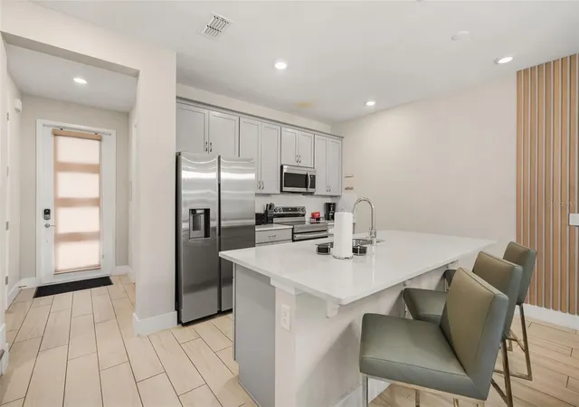 Photo 3 of Townhouse for sale at 7785 Spectrum Dr, Reunion, FL 34747 | MLS# O6448357 | Listing updated on 2026-10-24