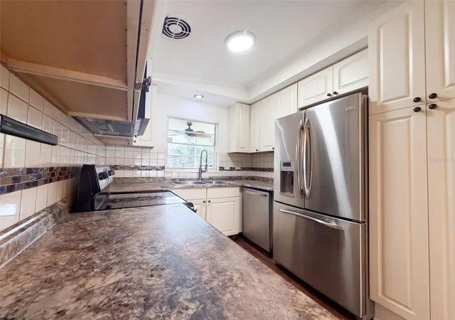 Photo 2 of Single family home for sale at 409 Berwick Ave, Temple Terrace, FL 33617 | MLS# O6448360 | Listing updated on 2026-10-10