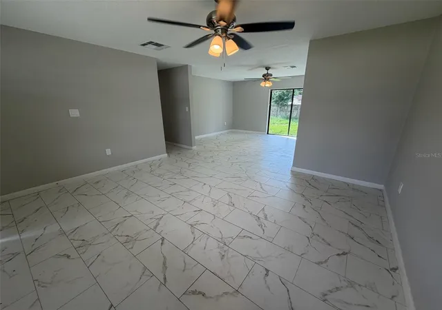 Photo 3 of Single family home for sale at 7008 Harwick Dr, Orlando, FL 32818 | MLS# O6448369 | Listing updated on 2026-10-09