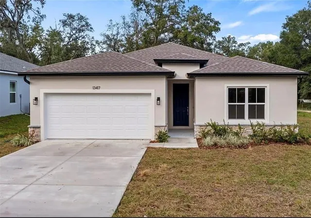 Single family home for sale at 13417 E Delaware Ave, ASTATULA, FL 34705 | MLS# S5159146