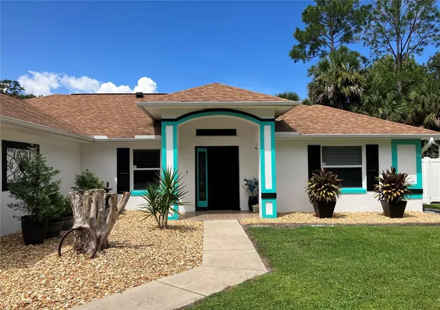 Photo 2 of Single family home for sale at 35 Pine Grv Dr, Palm Coast, FL 32164 | MLS# FC322002 | Listing updated on 2026-10-08