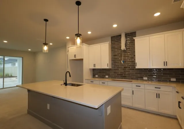 Photo 4 of Single family home for sale at 5410 Knotty Oak St, Mount Dora, FL 32757 | MLS# TB8556212 | Listing updated on 2026-10-08