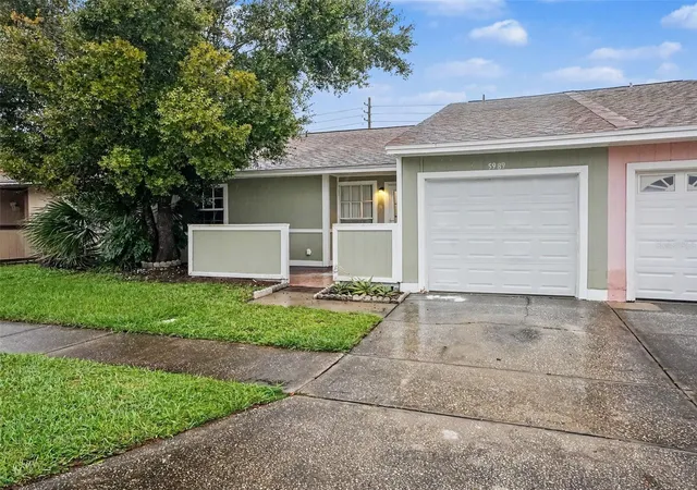 Photo 1 of Townhouse for sale at 5989 Talavera St, Orlando, FL 32807 | MLS# O6448383 | Listing updated on 2026-10-10
