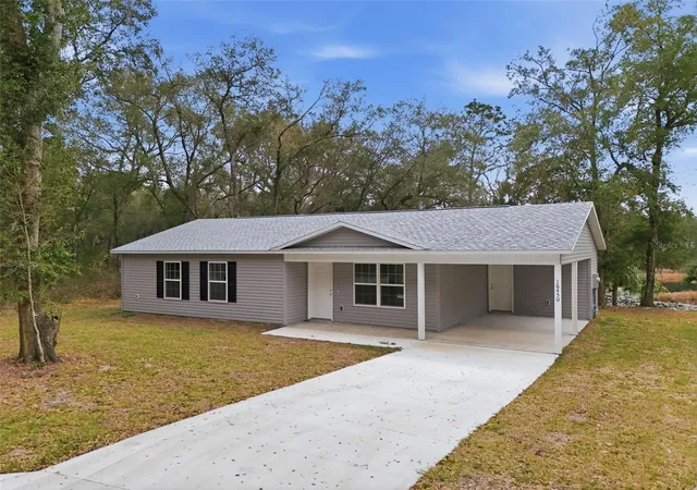 Photo 3 of Single family home for sale at 16450 SE 57th Place, Ocklawaha, FL 32179 | MLS# OM733696 | Listing updated on 2026-10-13