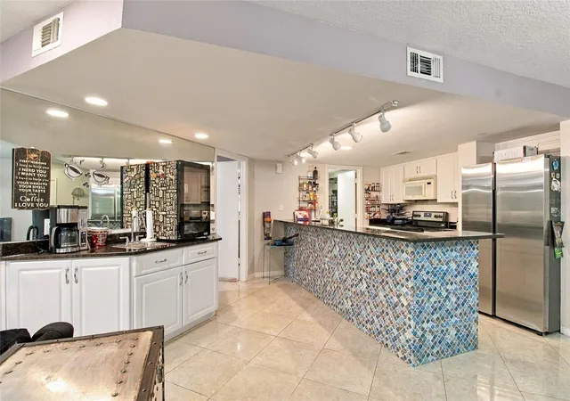 Photo 3 of Condo for sale at 2511 Dolly Bay Dr #104, Palm Harbor, FL 34684 | MLS# TB8556239 | Listing updated on 2026-10-09
