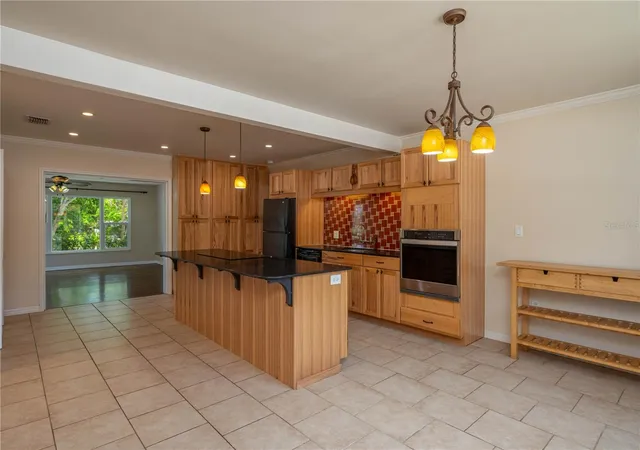 Photo 2 of Single family home for sale at 613 Palm Ave, Lake Wales, FL 33853 | MLS# K4903850 | Listing updated on 2026-10-15