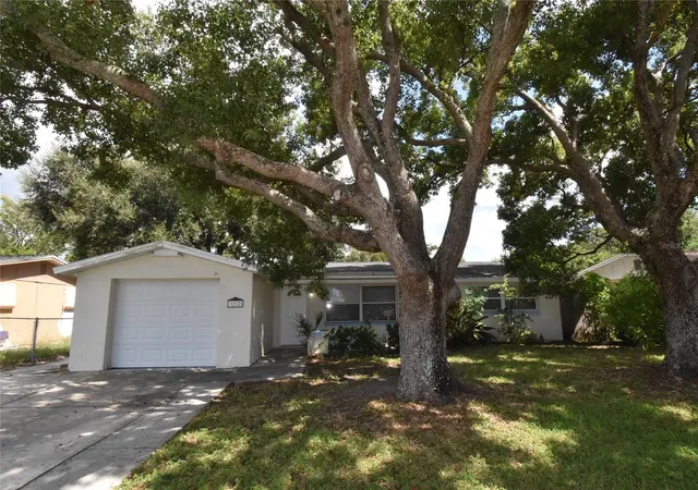 Photo 1 of Single family home for sale at 3212 Blue Bird Dr, Holiday, FL 34690 | MLS# C7531753 | Listing updated on 2026-10-09
